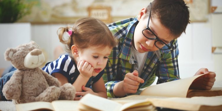 big brother teaches little sister